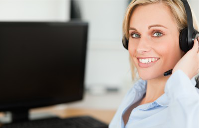 Blonde attractive woman with Headset